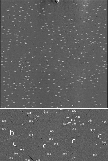 Granos de polvo vistos por la cámara OSIRIS (ESA/Rosetta/MPS for OSIRIS Team MPS/UPD/LAM/IAA/SSO/INTA/UPM/DASP/IDA).